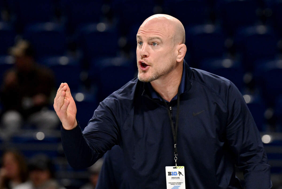 Penn State wrestling coach Cael Sanderson yells to Cole Mirasola during his semifinal bout at the Big Ten wrestling championships on Saturday, March 7, 2026 at the Bryce Jordan Center.