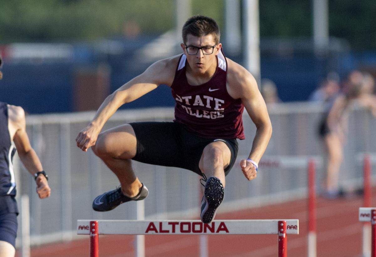 State College’s Ryan Lindenberg wins the 300 meter hurdles during the District 6 3A track and field championships on Thursday, May 19, 2022 at Mansion Park.
