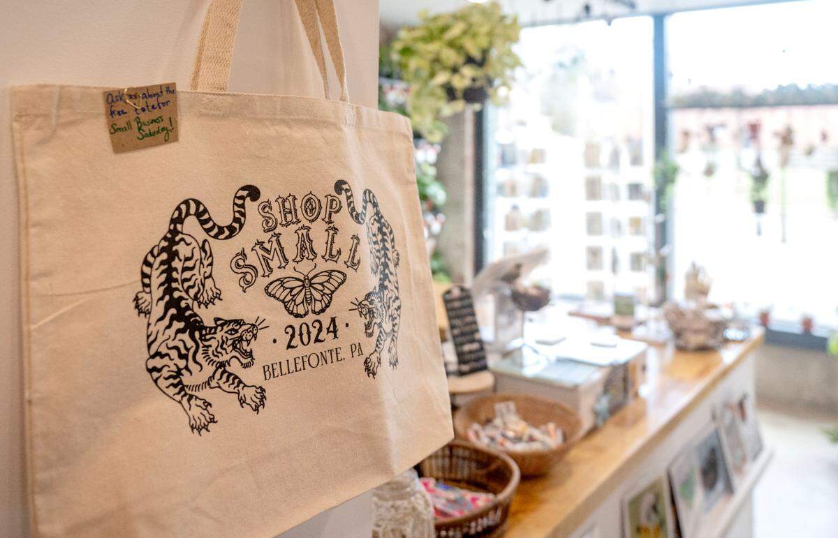 Jordan Haines designed tote bags for the Shop Small Crawl in Bellefonte that will be handed out at the Gamble Mill. The bag is on display at Smith + Front on Wednesday, Nov. 27, 2024.