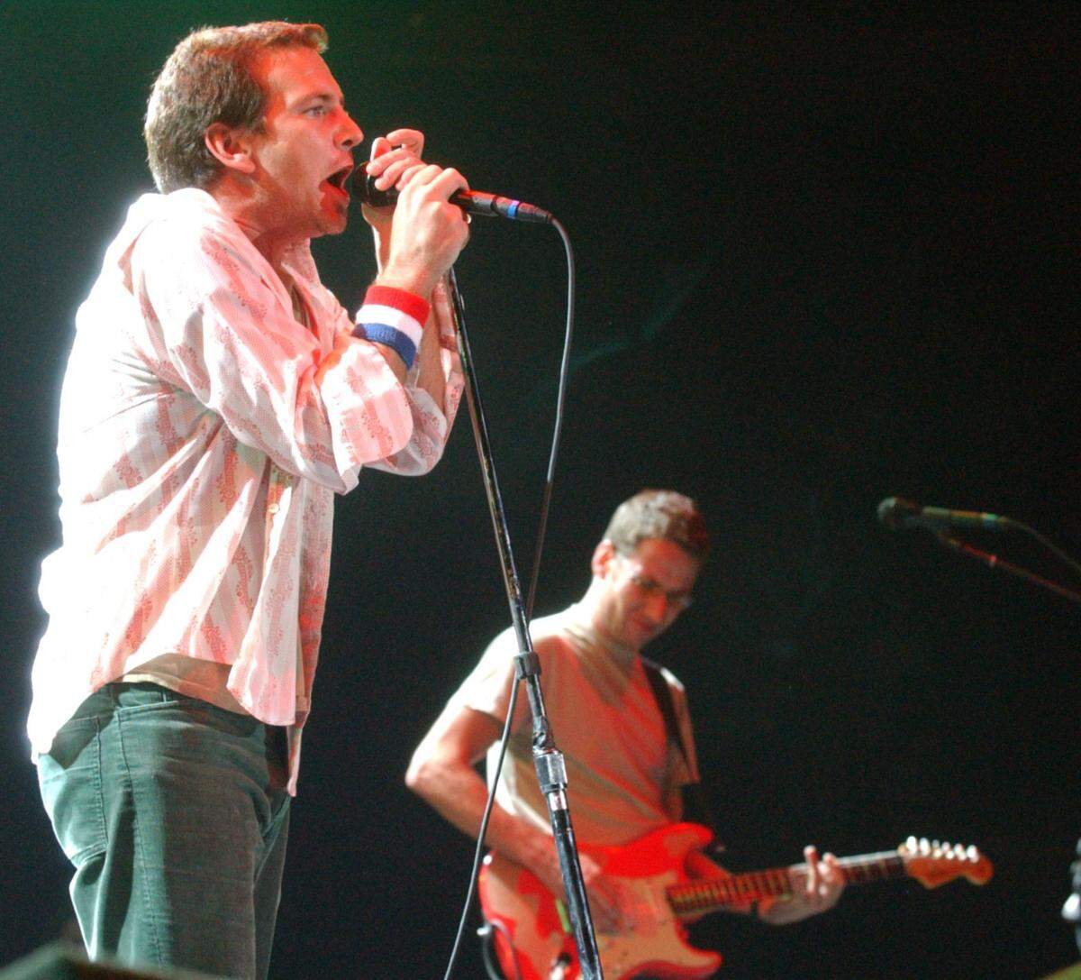 Pearl Jam lead singer Eddie Vedder and guitarist Stone Gossard perform before a sell-out crowd at the Bryce Jordan Center, Saturday, May 3, 2003