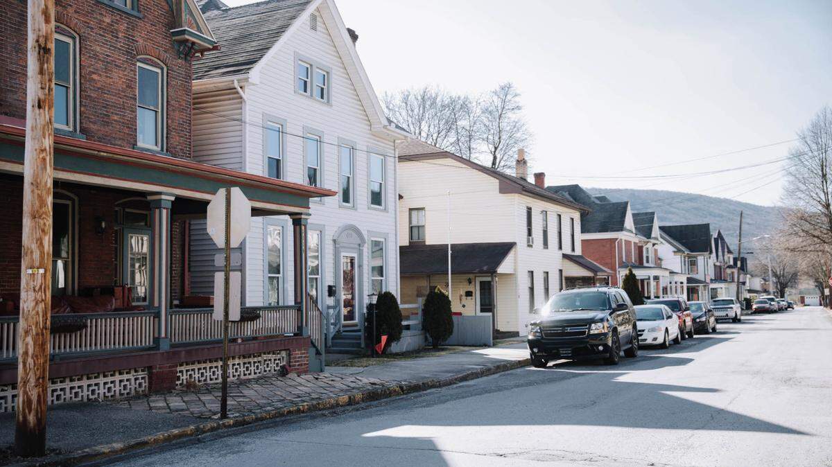 Houses are pictured on a street in Tyrone. The governor’s budget proposal would give rural areas a boost to invest in housing, address gaps in health care, and market the outdoor landscape.