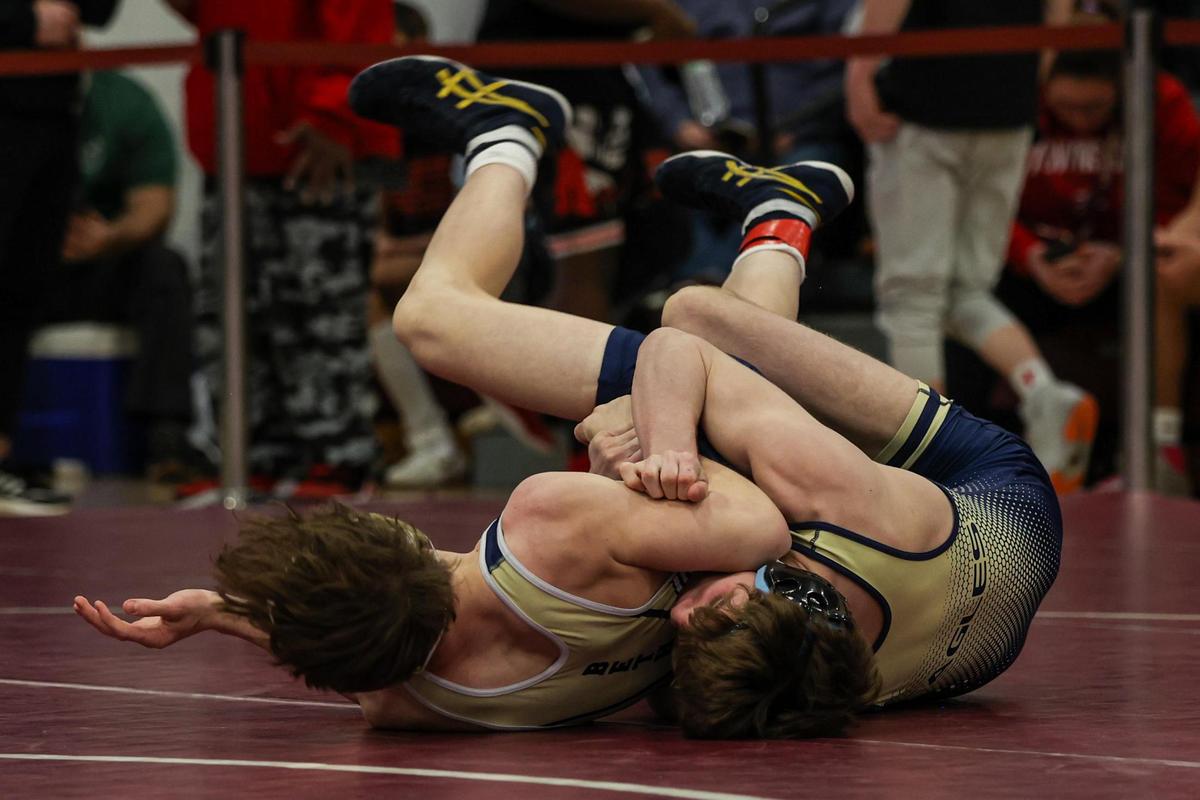 Bald Eagle Area’s Caden Judice records nearfall points on Beth-Center’s Mason Wright in their 133-pound second round match of the PIAA Class 2A Southwest Regional on Friday in Altoona. Judice defeated Wright, 16-0, in 4:53.