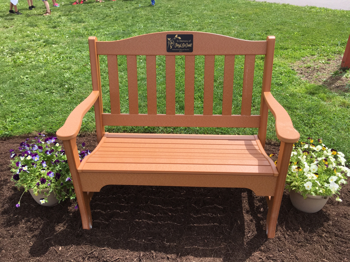 After Marion-Walker kindergarten teacher Cheryl DeCusati died, a bench was dedicated in her name.