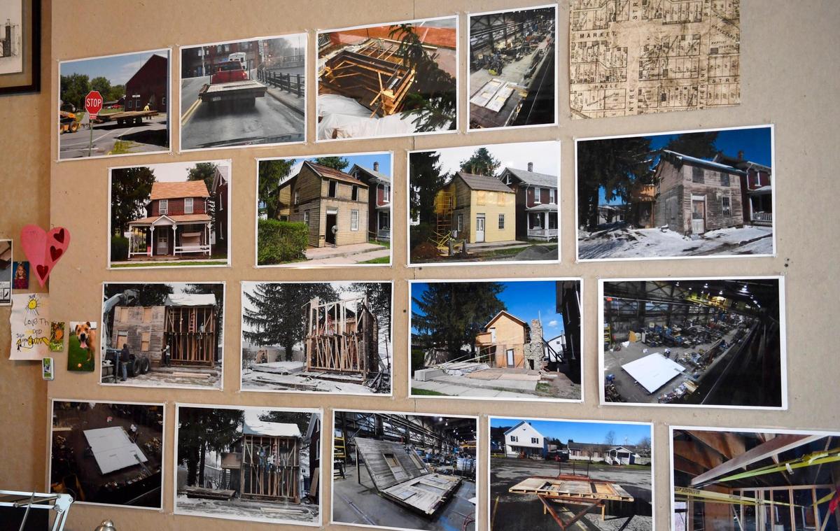 Photos of the progression of The Crooked House hang on the board inside of Benjamin Fehl’s studio in Milesburg.