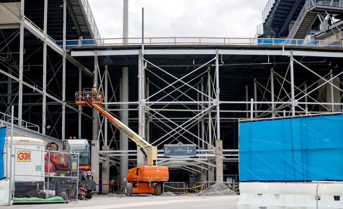 Construction crews work at Beaver Stadium on Thursday, May 16, 2024. Last May, the board of trustees voted to move forward with a $70 million renovation that included winterizing the stadium. Up to $700 million in further renovations is expected to be discussed Tuesday.