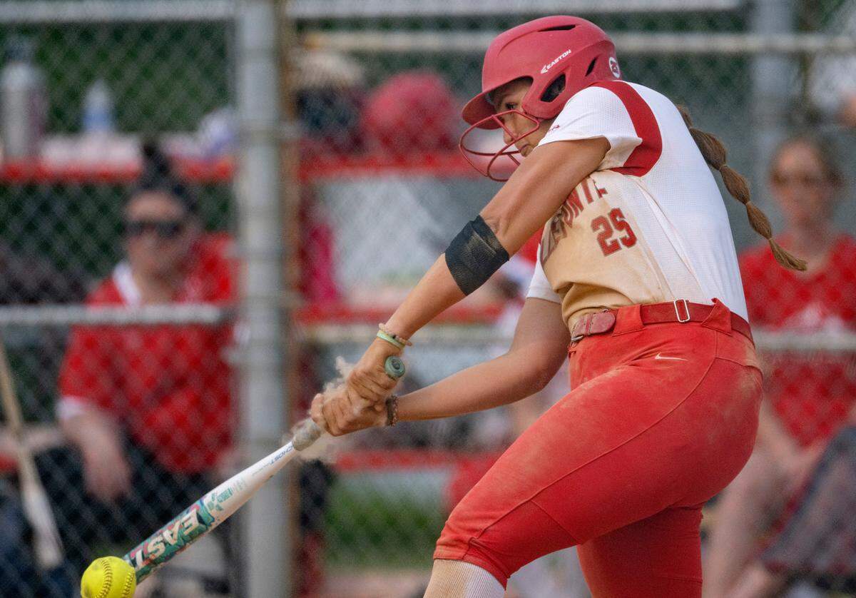 Bellefonte’s Taylor Brown hits a single that scores a run during the game against Montour in the first round of the PIAA class 4A softball playoffs on Monday, June 5, 2023.