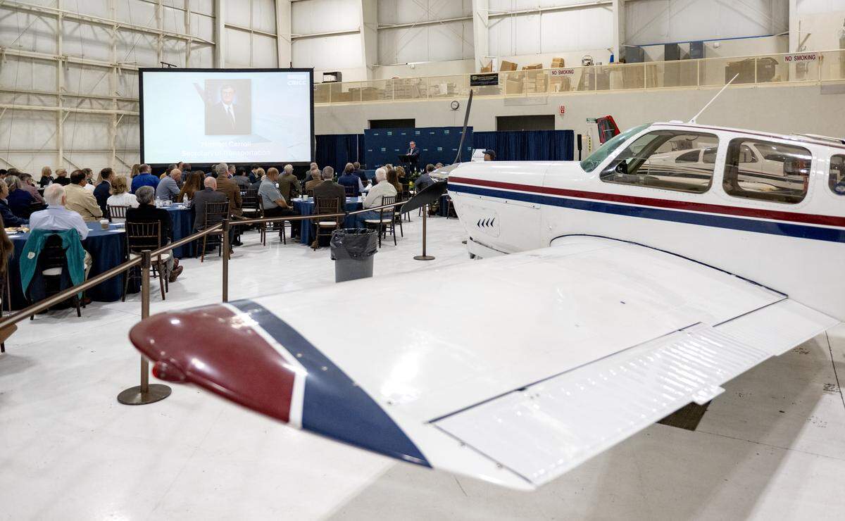 Michael Carroll, the state secretary of transportation, speaks during the State College Air Service Summit on Tuesday, Oct. 14, 2025 at a hangar at the State College Regional Airport. 