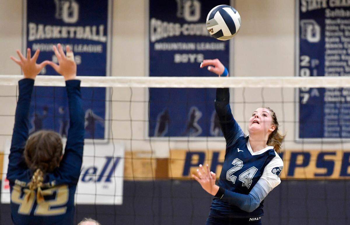 Philipsburg-Osceola’s Reese Hazelton hits the ball as Bald Eagle Area defenders jump during the District 6 2A semi-final game on Thursday, Nov. 4, 2021.
