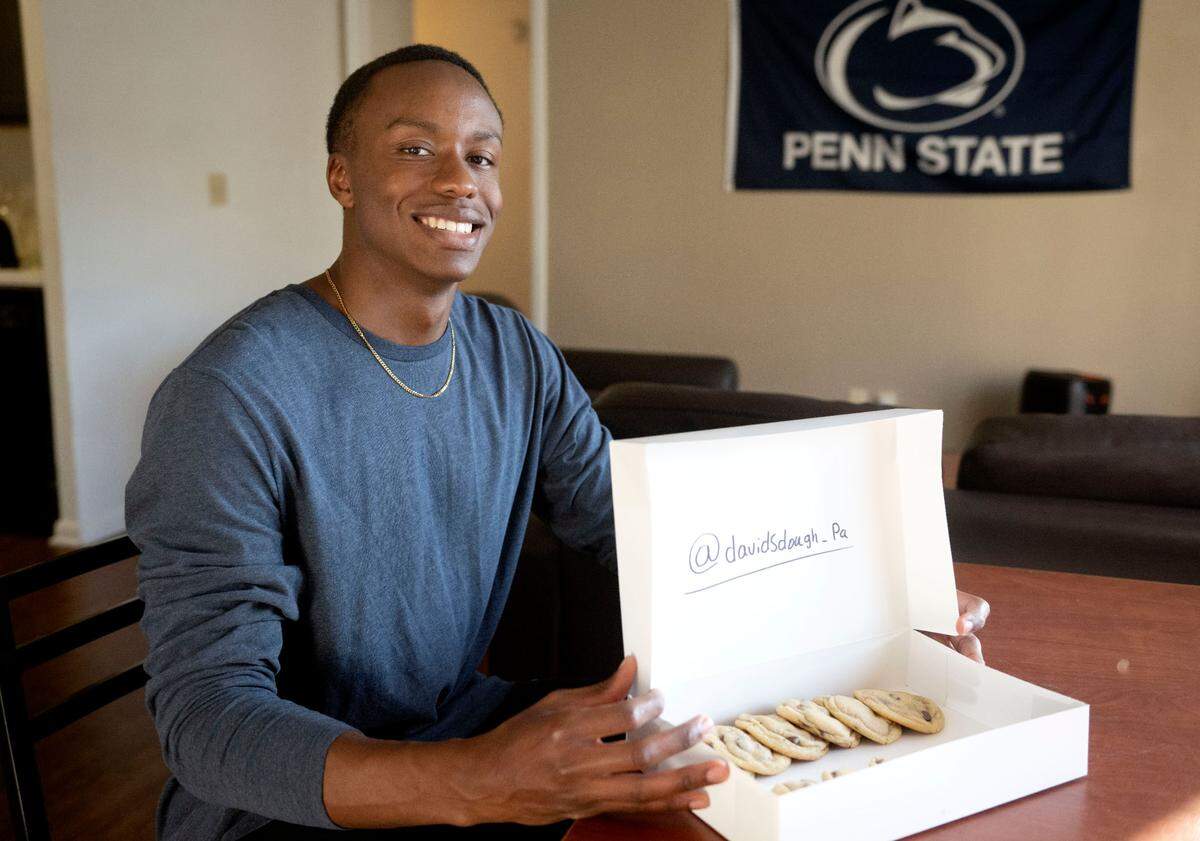 David Hayes shows a package of his chocolate chip cookies on Monday, Nov. 13, 2023.