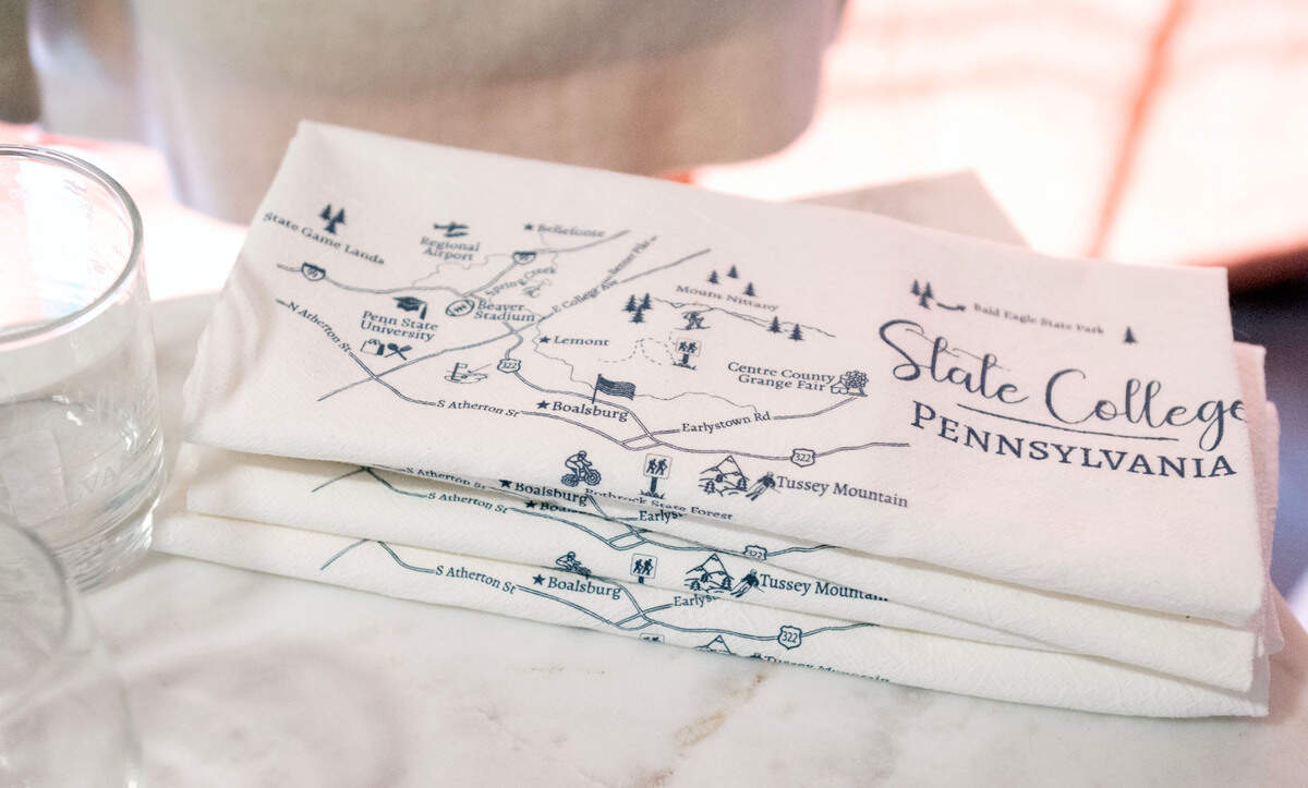 Custom designed State College tea towels available at Town Pride at 240 E. Calder Way on Monday, March 17, 2025.