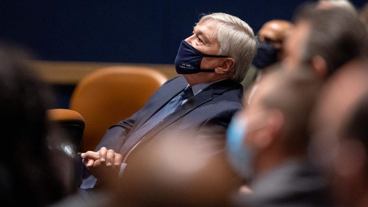 Penn State President Eric Barron listens as his successor, Neeli Bendapudi, speaks in December.