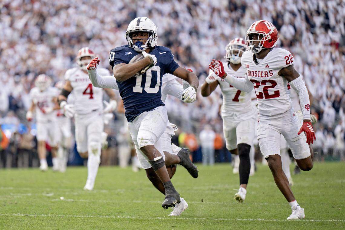 Penn State running back Nick Singleton cuts down the field with the ball from Indiana defenders during the game on Saturday, Nov. 8, 2025.