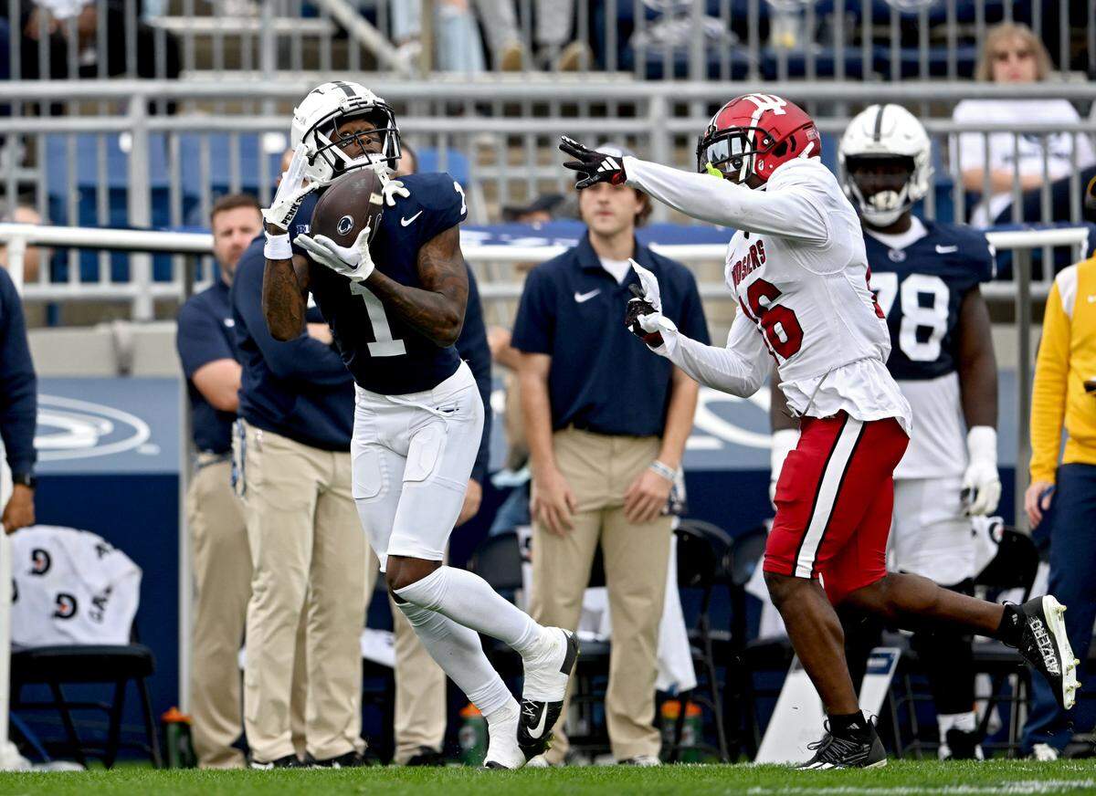 Penn State wide receiver KeAndre Lambert-Smith makes a catch ahead of Indiana’s Jordan Grier and runs it in for a touchdown during the game on Saturday, Oct. 28, 2023.