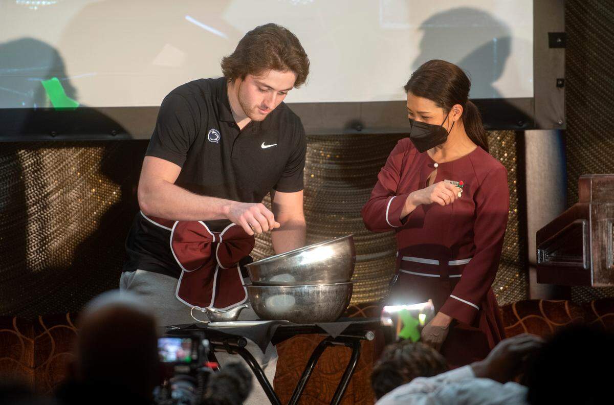 Penn State punter Barney Amor does the traditional salad spin at the Lawry’s Beef Bowl on Friday, Dec. 30, 2022.