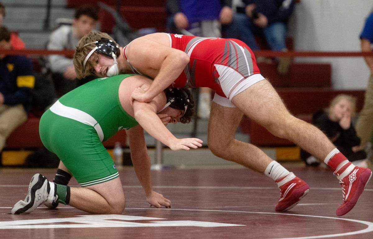 Bellefonte’s Addison Shawley wrestles Braedan Oravecz in the 189 lb third place bout of the District 6 2A championships on Saturday, Feb. 18, 2023.