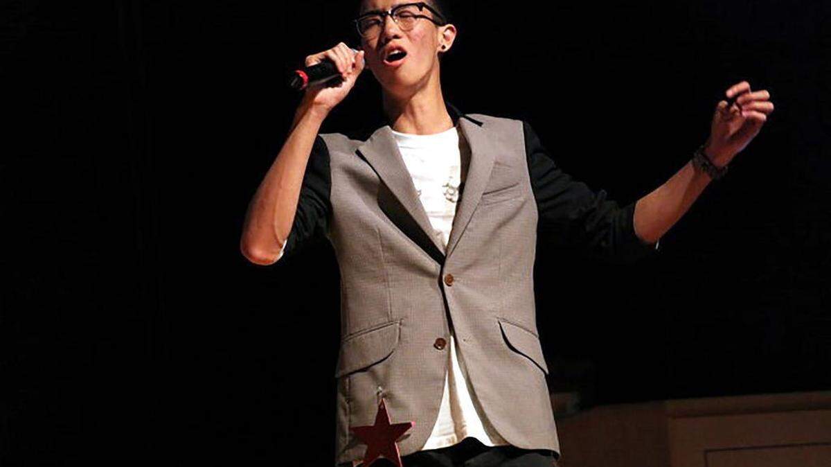 Xin Liu performs at a karaoke competition hosted by the Chinese Undergraduate Student Association and the Taiwanese American Student Association in October. Liu won first place. 
