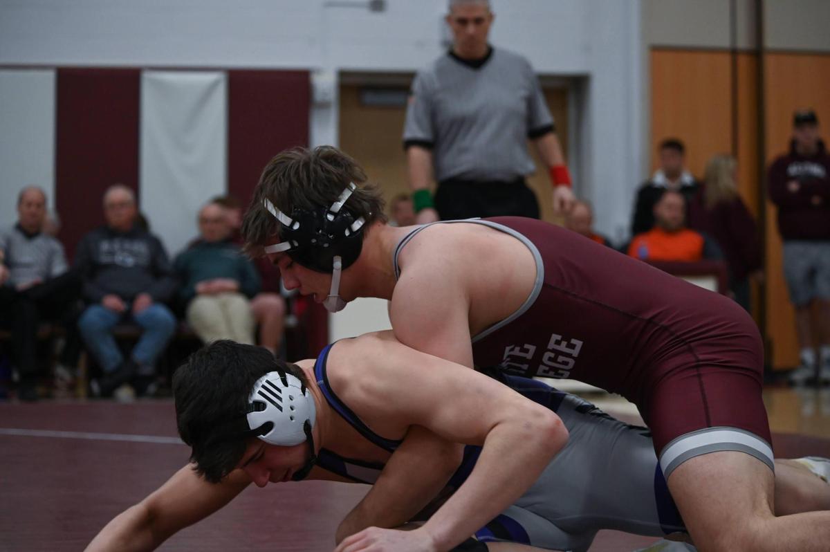 State College’s Carter Weaverling controls Mifflin County’s Avery Aurand in their 172-pound finals match of the PIAA Class 3A Northwest Regional Championships on Saturday, Feb. 25, 2023 in Altoona. Weaverling edged Aurand, 3-1.
