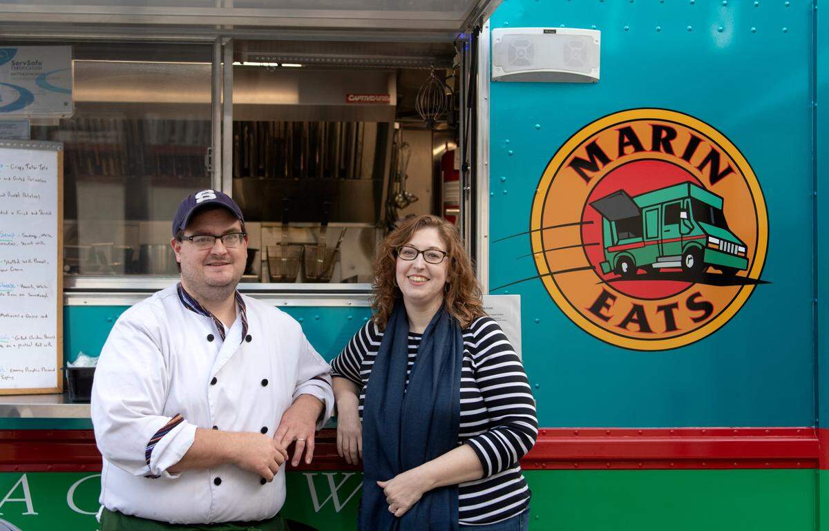 Matt and Erin McKean of Marin Eats food truck outside of Axemann Brewery on Thursday, Nov, 4, 2021.