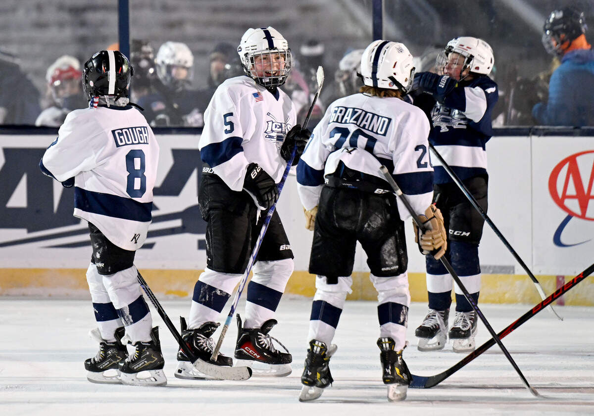 George Duhon and his teammates laugh as they play on the ice at Beaver Stadium on Wednesday, Jan. 28, 2026.
