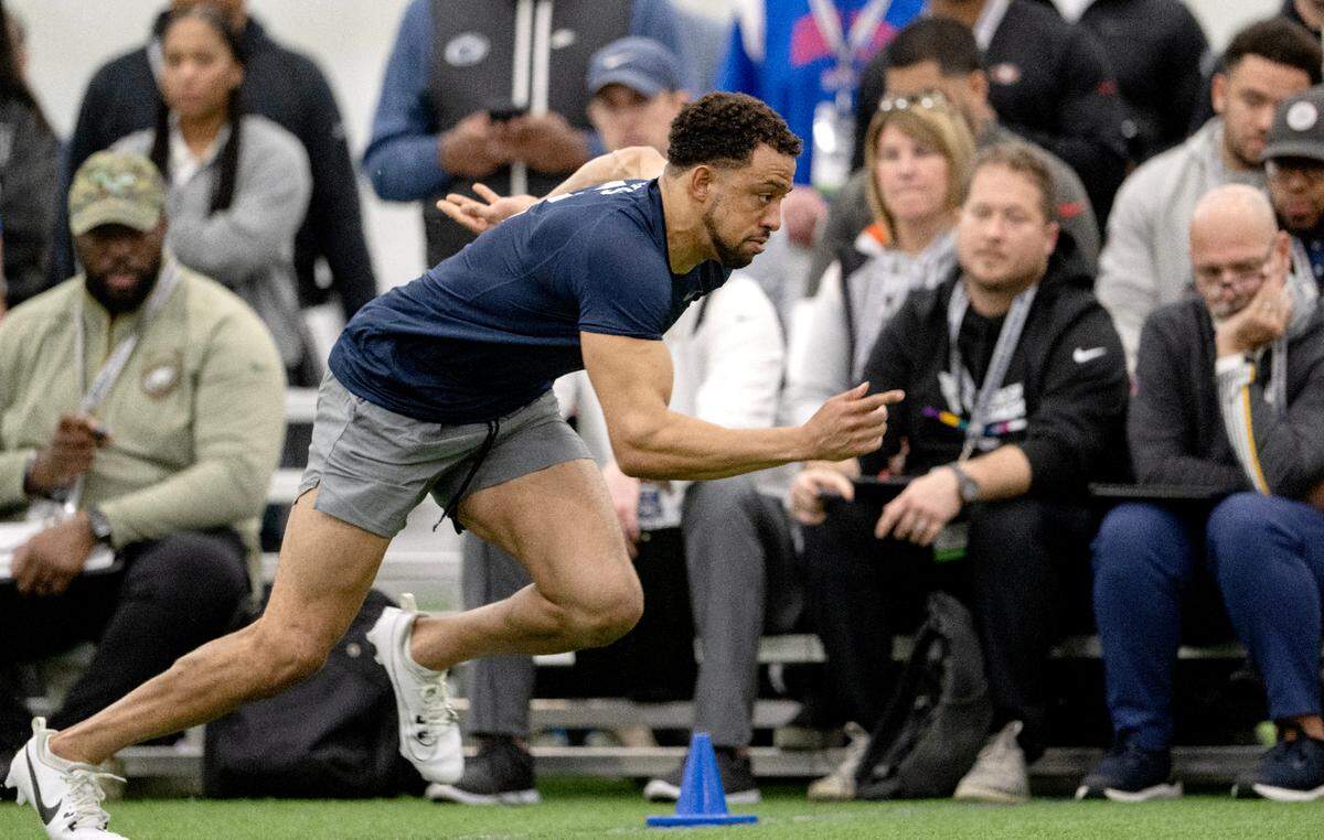 Safety Keaton Ellis runs the 3 cone drill during Penn State’s Pro Day on Friday, March 15, 2024 in Holuba Hall.