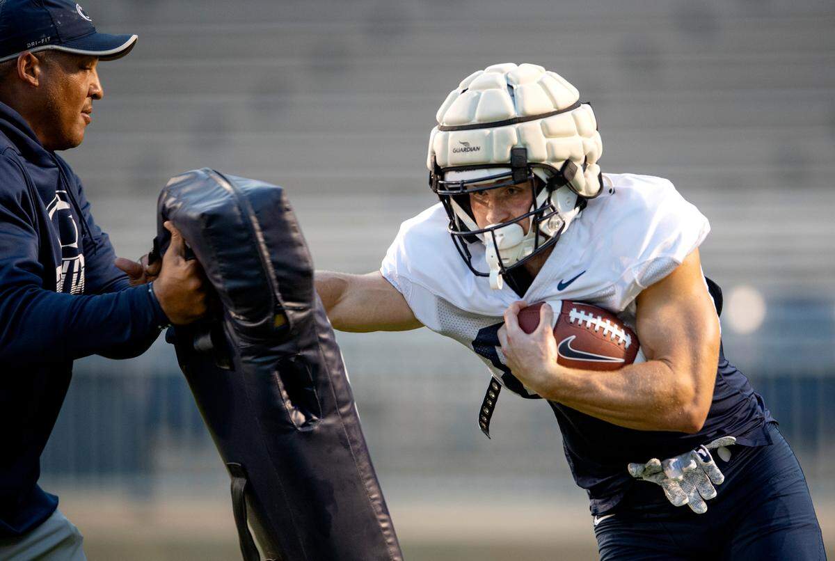 Penn State wide receiver Liam Clifford runs a drill during practice on Wednesday, Aug. 25, 2021 in Beaver Stadium.