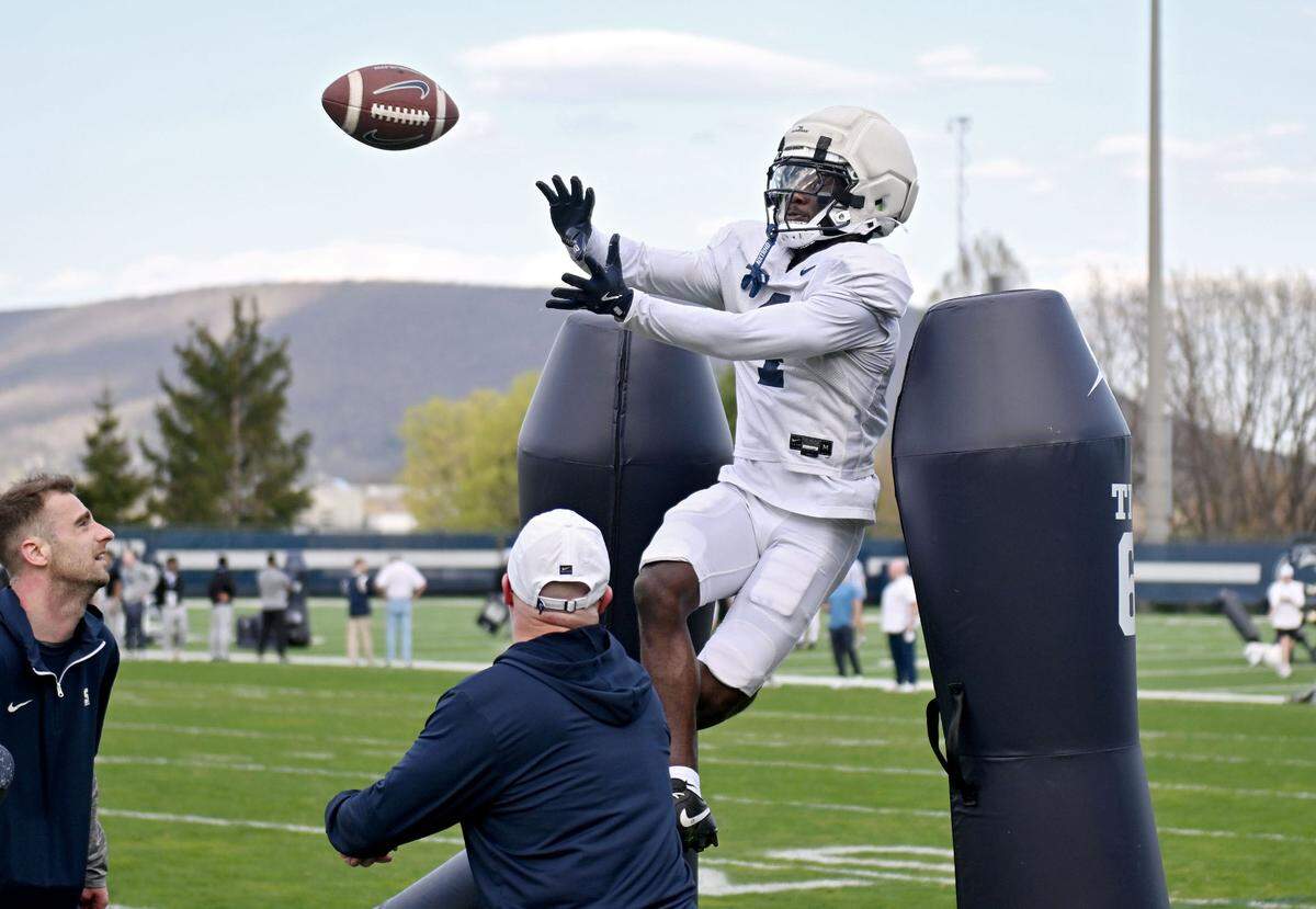 Penn State wide receiver Tyseer Denmark makes a catch as he runs a drill during spring practice on Wednesday, April 23, 2025.
