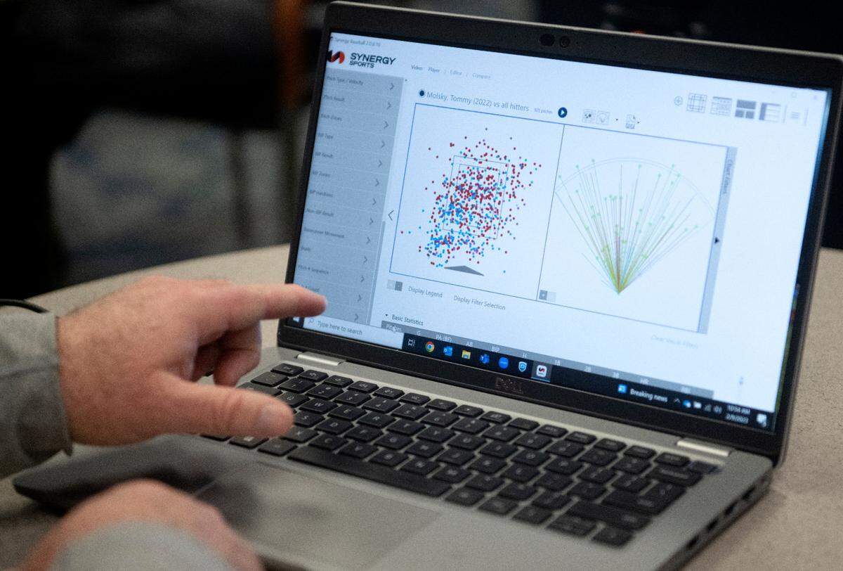 Penn State baseball coach Rob Cooper shows some of the data from former pitcher Tommy Molsky as he talks about the technology on Thursday, Feb. 9. 2023.