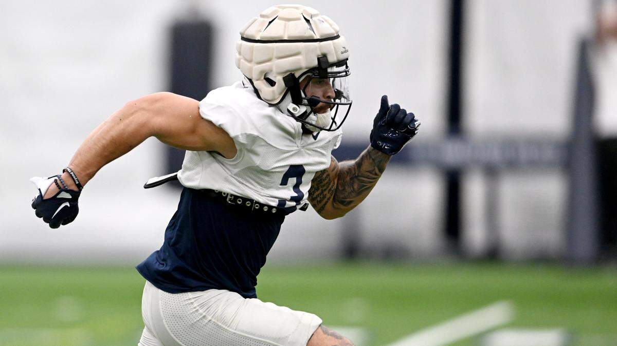 Penn State wide receiver Julian Fleming runs a drill during practice on Tuesday, April 2, 2024.