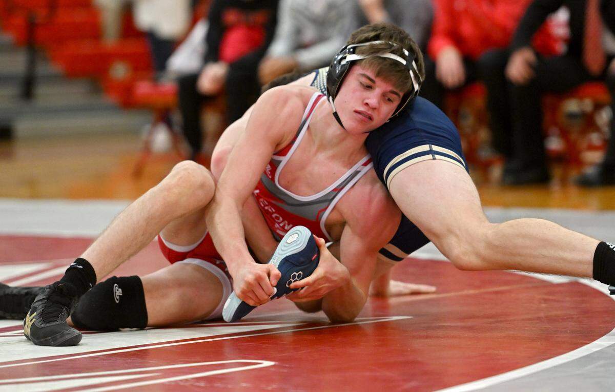 Bellefonte’s Ezra Swisher controls Bald Eagle Area’s Conner Maney in the 139 lb bout of the match on Tuesday, Jan. 23, 2024.