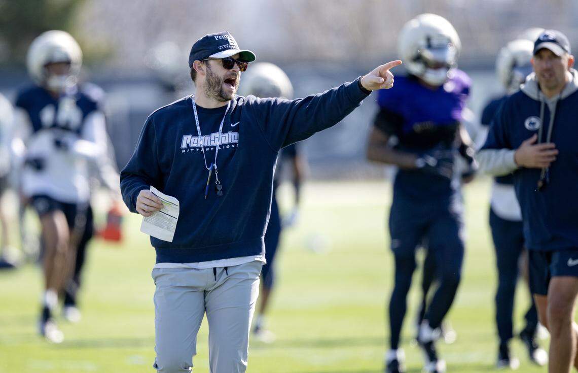 Penn State offensive coordinator Taylor Mouser yells to players during practice on Thursday, April 9, 2026.