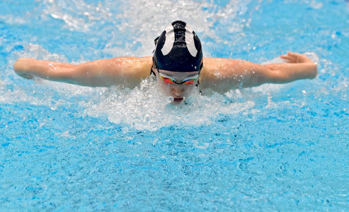 Penns Valley’s Sophia Gerhart competes in the girls AA 100 yard butterfly during the District 6 swimming championships on Friday, Feb. 28, 2020.