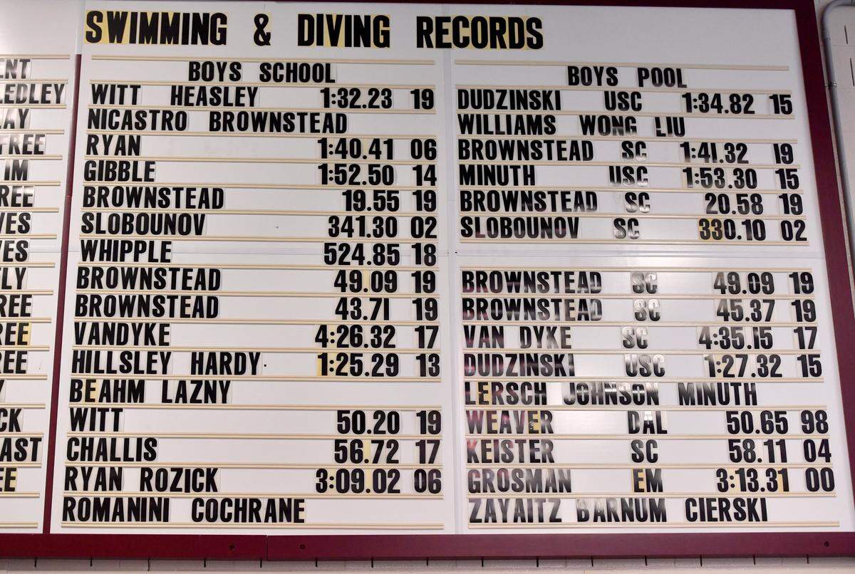 The record board in State College Area High School natatorium with several records set by Matt Brownstead.