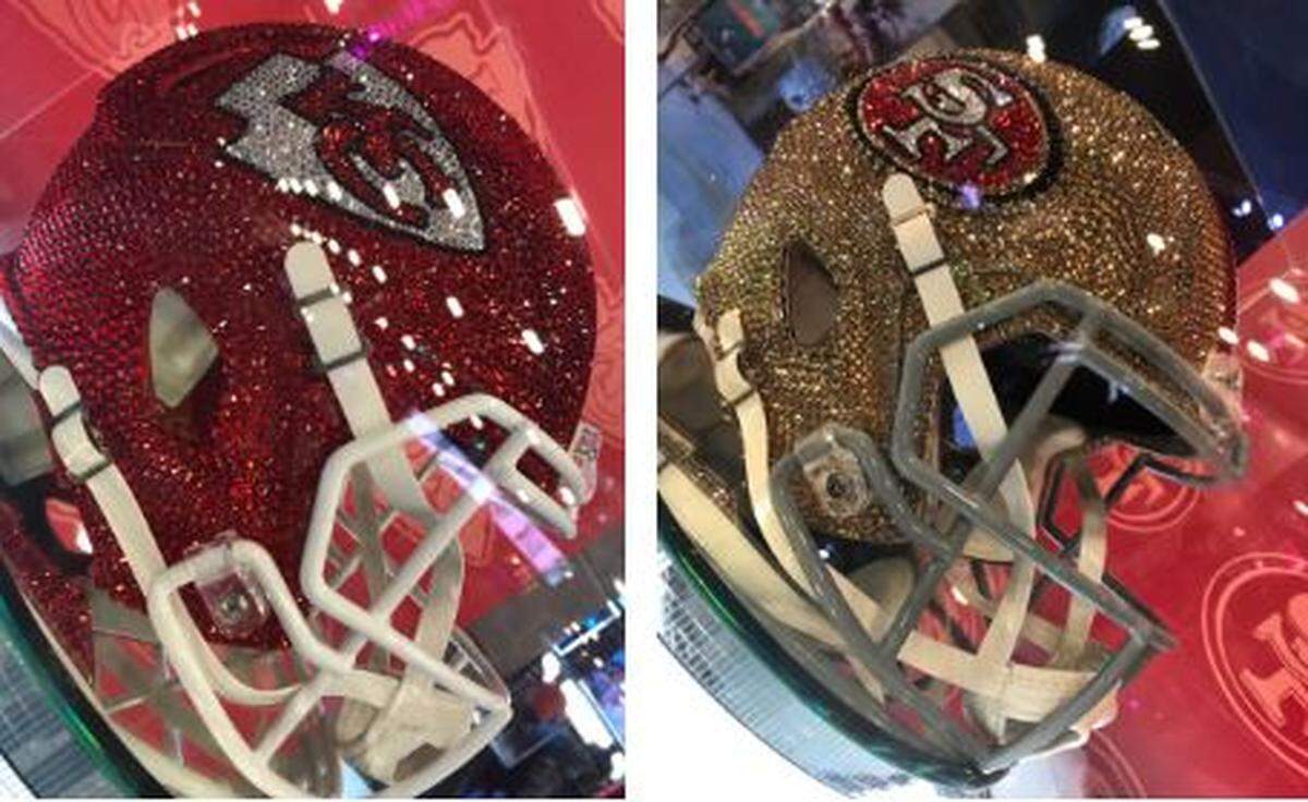  Bedazzled football helmets were hard to miss at the  NFL Fan Experience in the Miami Beach Convention Center during Super Bowl week in Miami. 