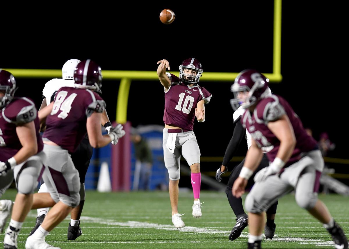 State College’s senior quarterback Brady Dorner makes a pass during the game against Harrisburg on Friday, Oct. 4, 2019.