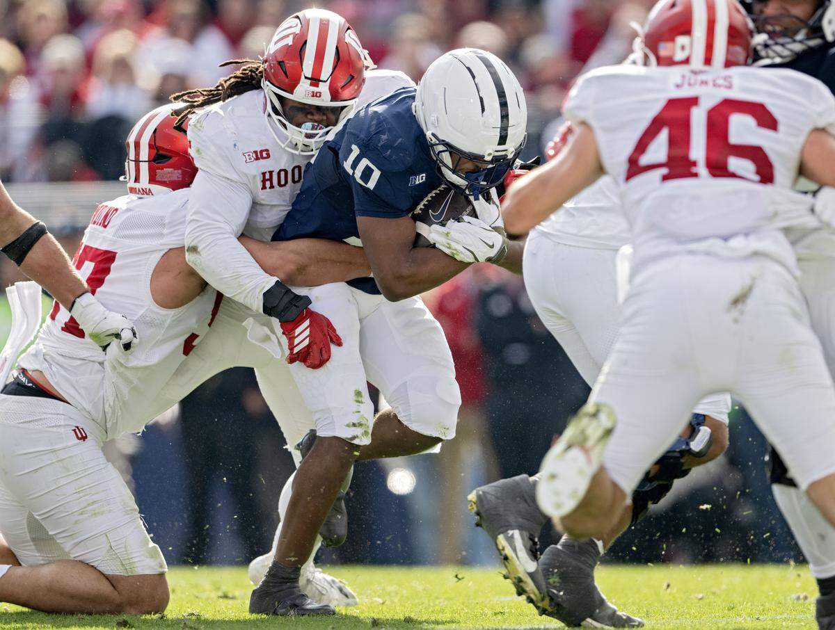 Penn State running back Nick Singleton pushes through Indiana defenders for a touchdown during the game on Saturday, Nov. 8, 2025. 