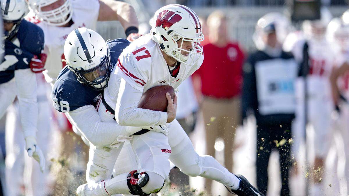 Penn State defensive end Shareef Miller sacks Wisconsin quarterback Jack Coan during the game on Saturday, Nov. 10, 2018.  