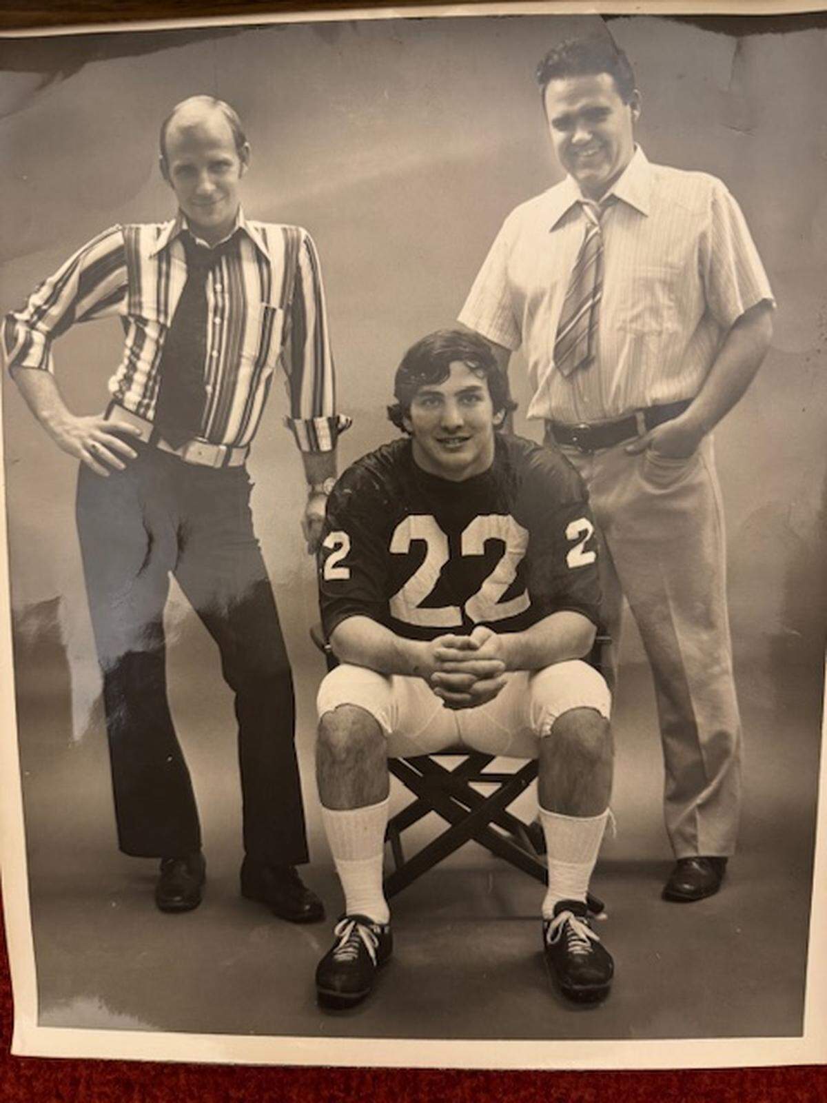 Former Centre Daily Times writers Doug McDonald, right, and Ron Bracken, left, pose with Penn State running back and 1973 Heisman Trophy winner John Cappelletti.