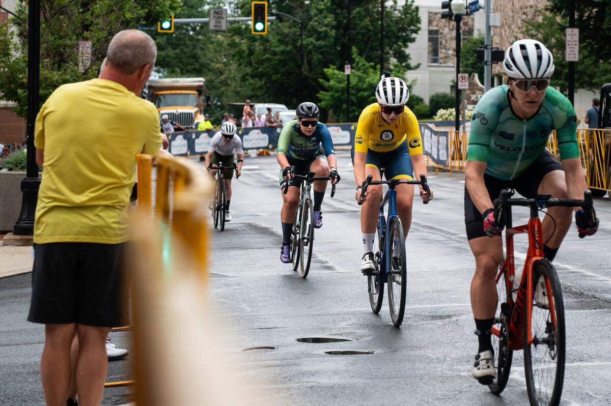 Women’s Cat 1, Cat 2 and Cat 3 racers cycle down Beaver Avenue during the State College Criterium on Saturday, July 26, 2025 in State College, Pa.