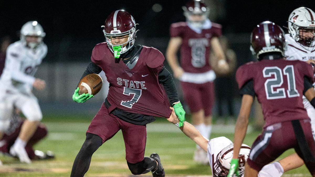 Altoona defenders can’t stop State College’s D’Antae Sheffey during the District 6 6A championship game at Bald Eagle Area on Thursday, Nov. 10, 2022. State College won, 28-7.