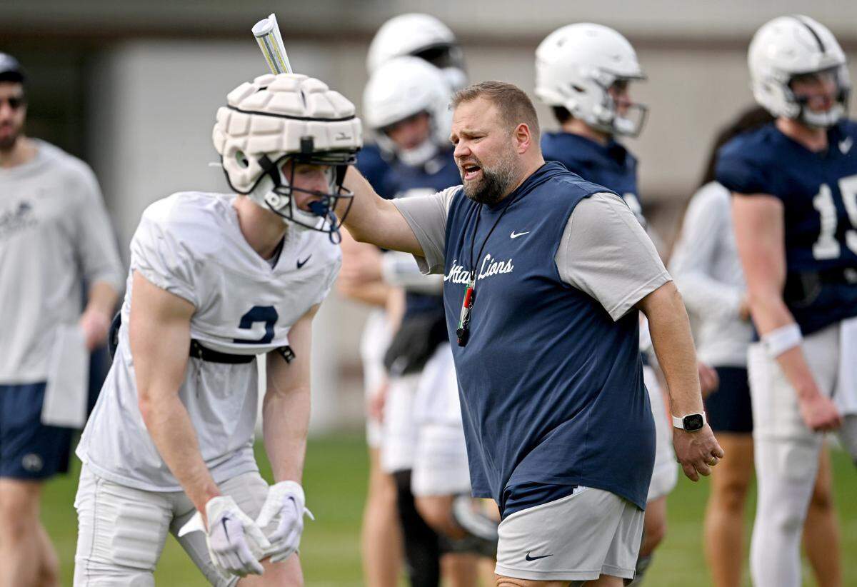 Penn State offensive coordinator Andy Kotelnicki yells to players during a spring practice on Tuesday, April 9, 2024.