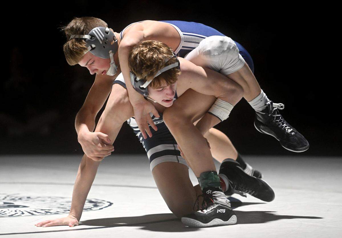 Penns Valley’s Brayden Lisowski and Philipsburg-Osceola’s Sam McDonald wrestling in the 121 lb bout of the match on Tuesday, Jan. 31, 2023 as part of the the District 6 team tournament.