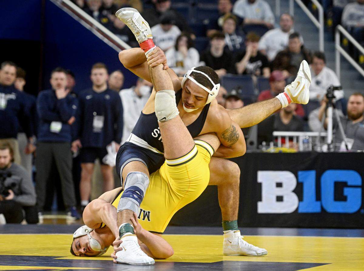 Penn State’s Aaron Brooks controls Michigan’s Matt Finesilver in a 184 lb semifinal bout of the Big Ten wrestling championships at the Crisler Center on Saturday, March 4, 2023.