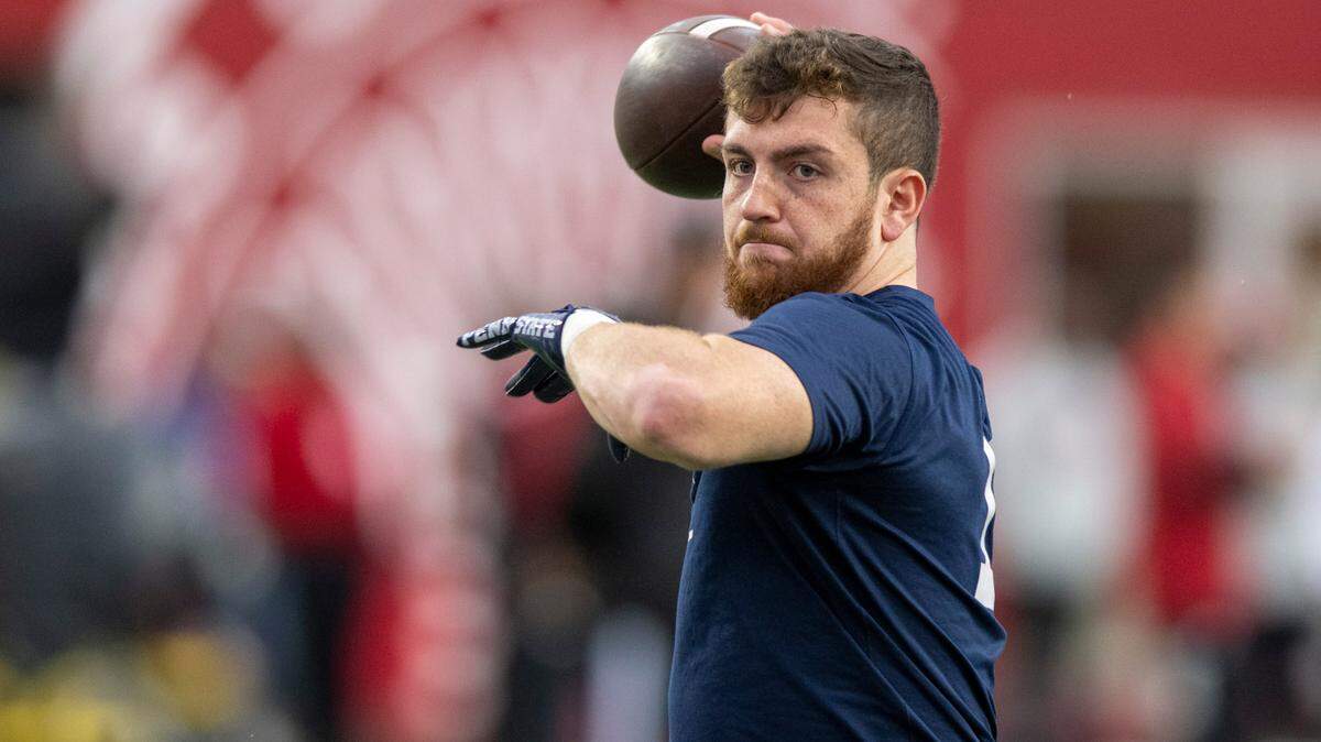 Penn State quarterback Sean Clifford (14) warms up before an NCAA college football game against Indiana, Saturday, Nov. 5, 2022, in Bloomington, Ind.
