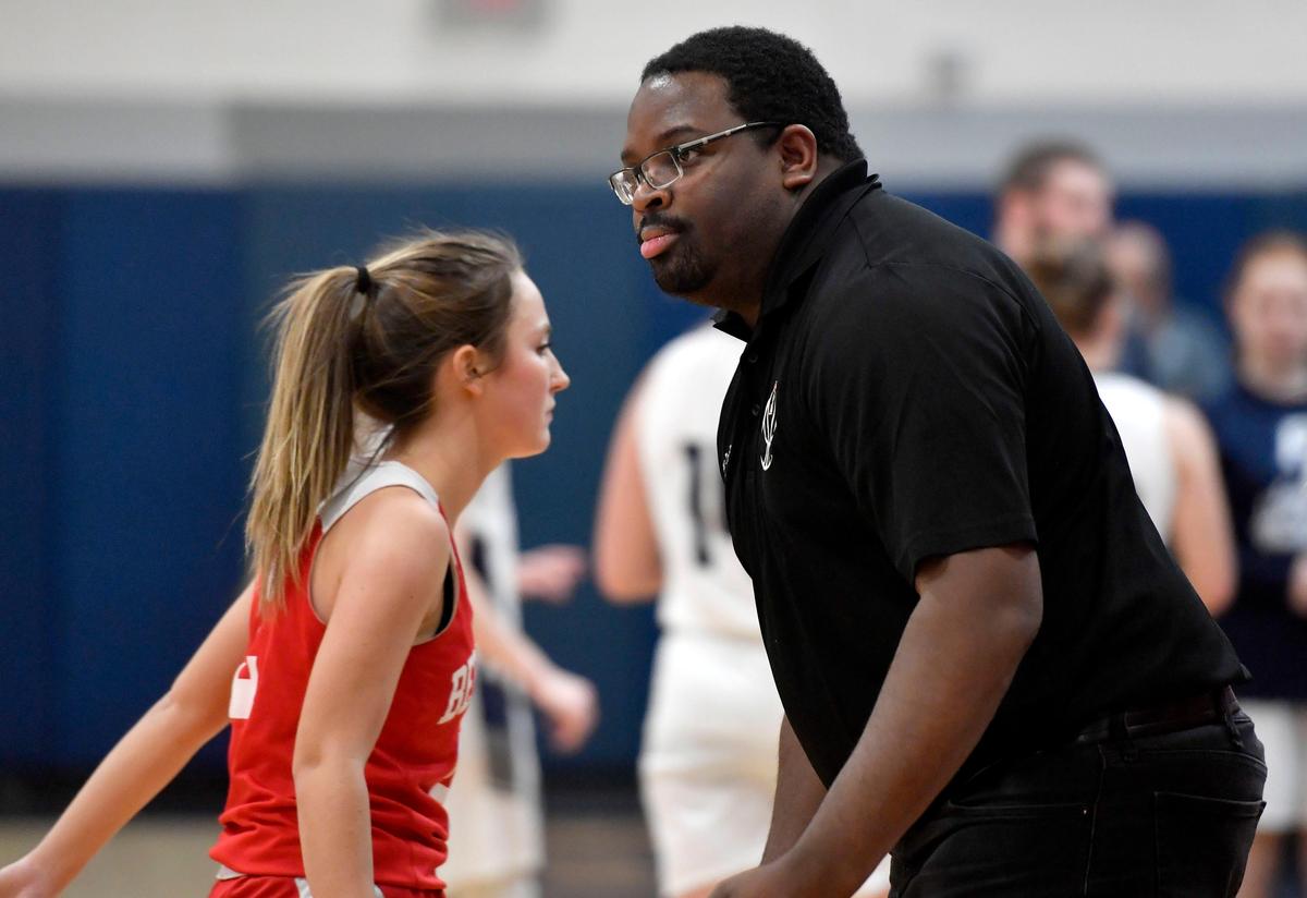 Bellefonte girls basketball coach Marcus Toomer high fives his girls as they come in between quarter of the game against Philipsburg-Osceola on Wednesday, Jan. 22, 2020. Bellefonte won, 54-30.