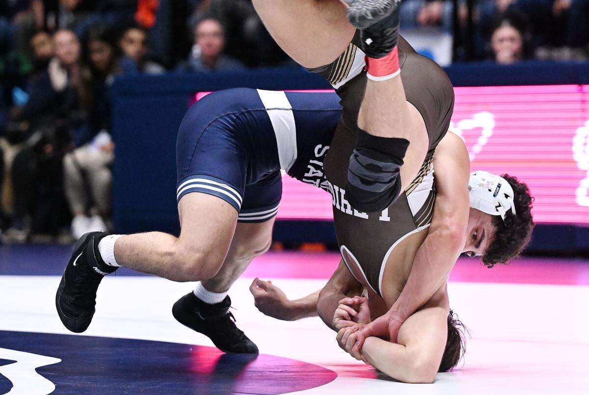 Penn State’s Beau Bartlett (rear) takes down Lehigh’s Carter Bailey (141 lbs) during Sunday’s match at Rec Hall at Penn State. Bartlett defeated Bailey in a major decision, 14-6. Penn State defeated Lehigh, 30-10.