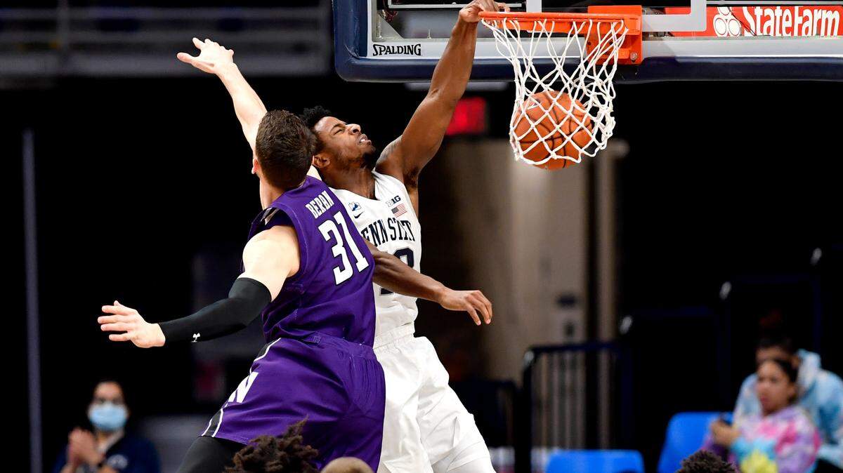 Northwestern’s Robbie Beran can’t stop Penn State’s Izaiah Brockington during the game on Saturday, Jan. 23, 2021 at the Bryce Jordan Center.