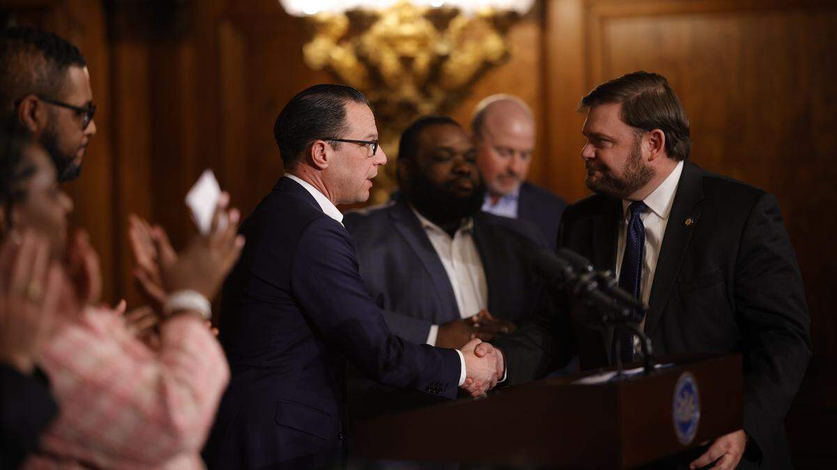 Gov. Josh Shapiro shakes hands with state Senate Majority Leader Joe Pittman (right) in 2023.