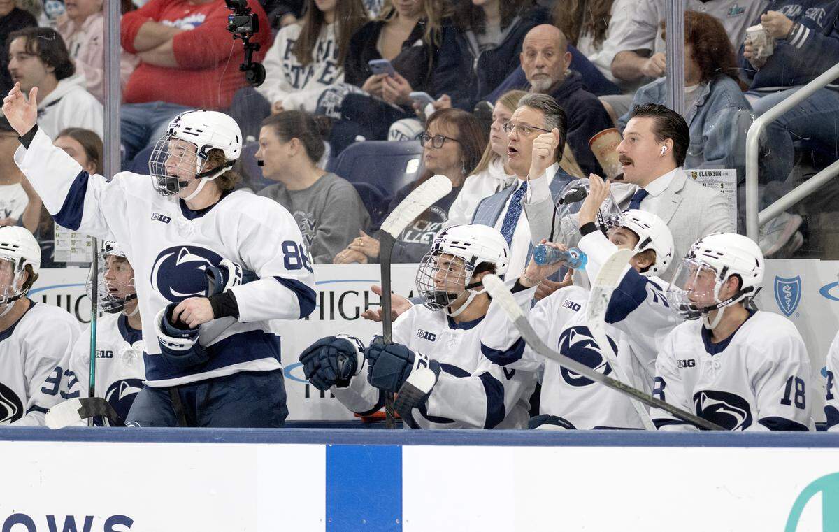 Penn State men's hockey coach Guy Gadowsky and assistant coach Andrew Sturtz yell to the players during the game against Clarkson on Thursday, Oct. 9, 2025. Clarkson won, 6-4.