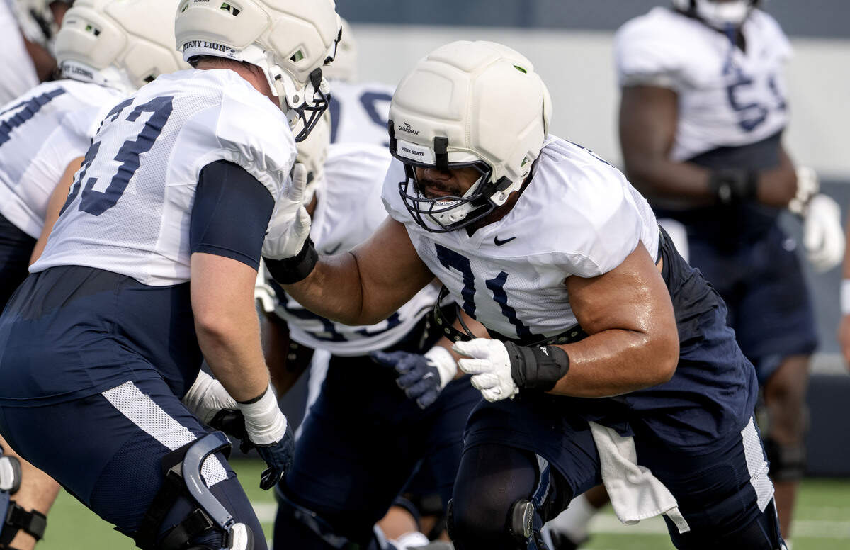 Penn State offensive lineman Olaivavega Ioane runs a drill drill during practice on Saturday, Aug. 2, 2025.