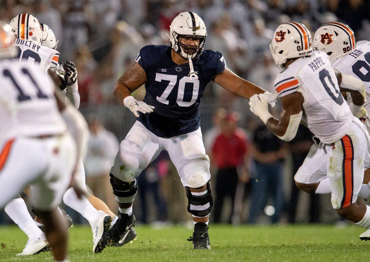 Penn State offensive lineman Juice Scruggs blocks Auburn defenders during the game against Auburn on Saturday, Sept. 18, 2021.